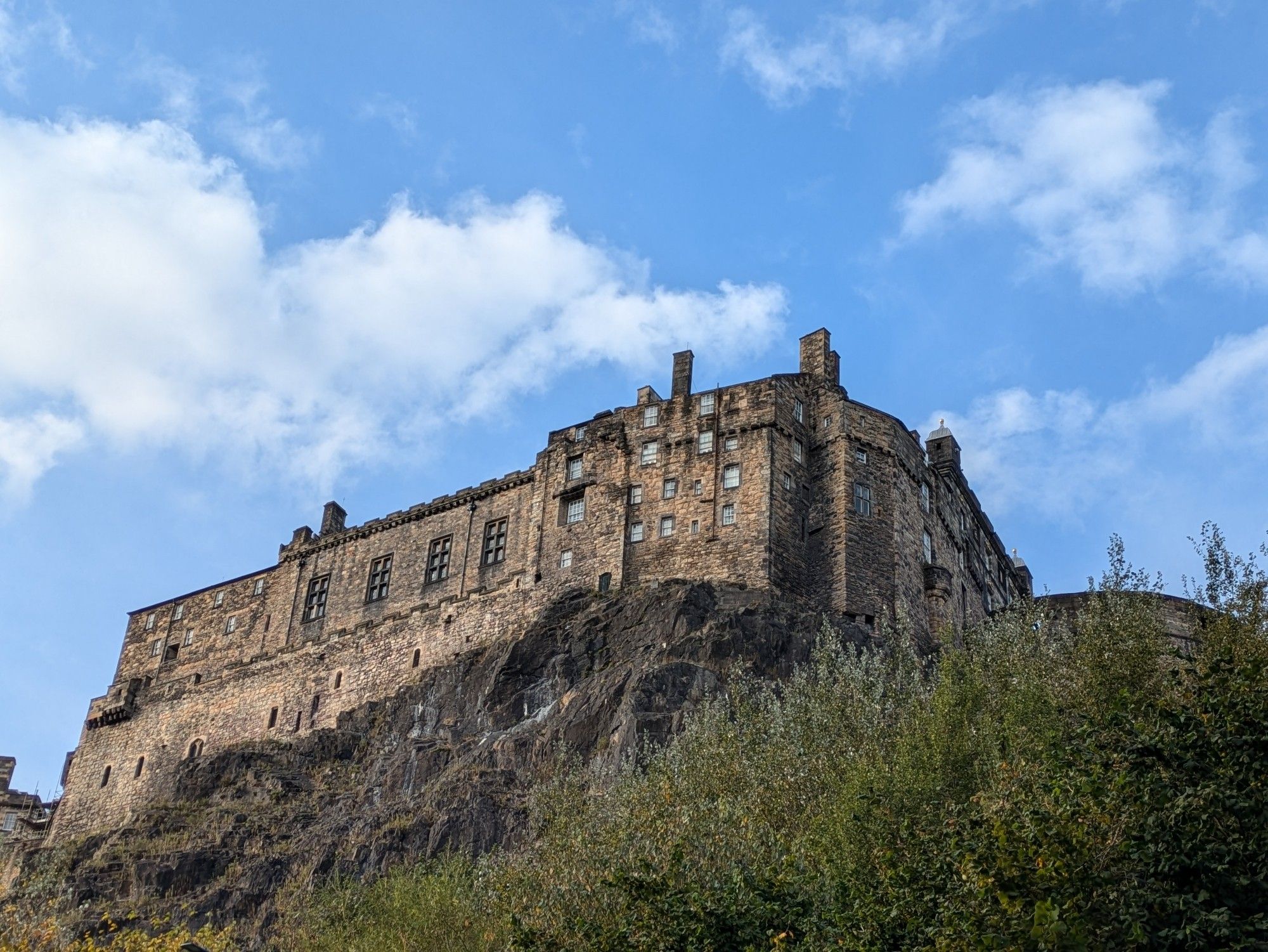 Back of Edinburgh Castle against a blue sky