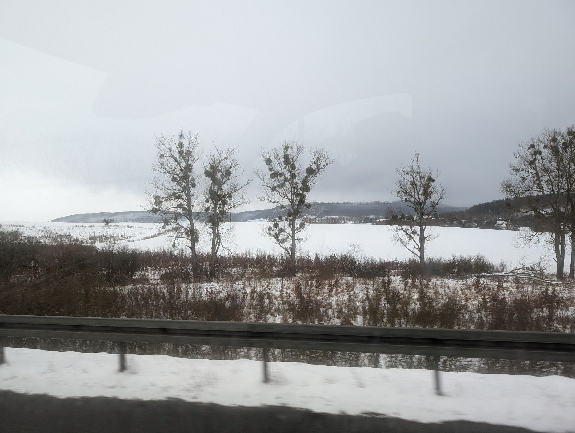 Side view onto snow-covered hills