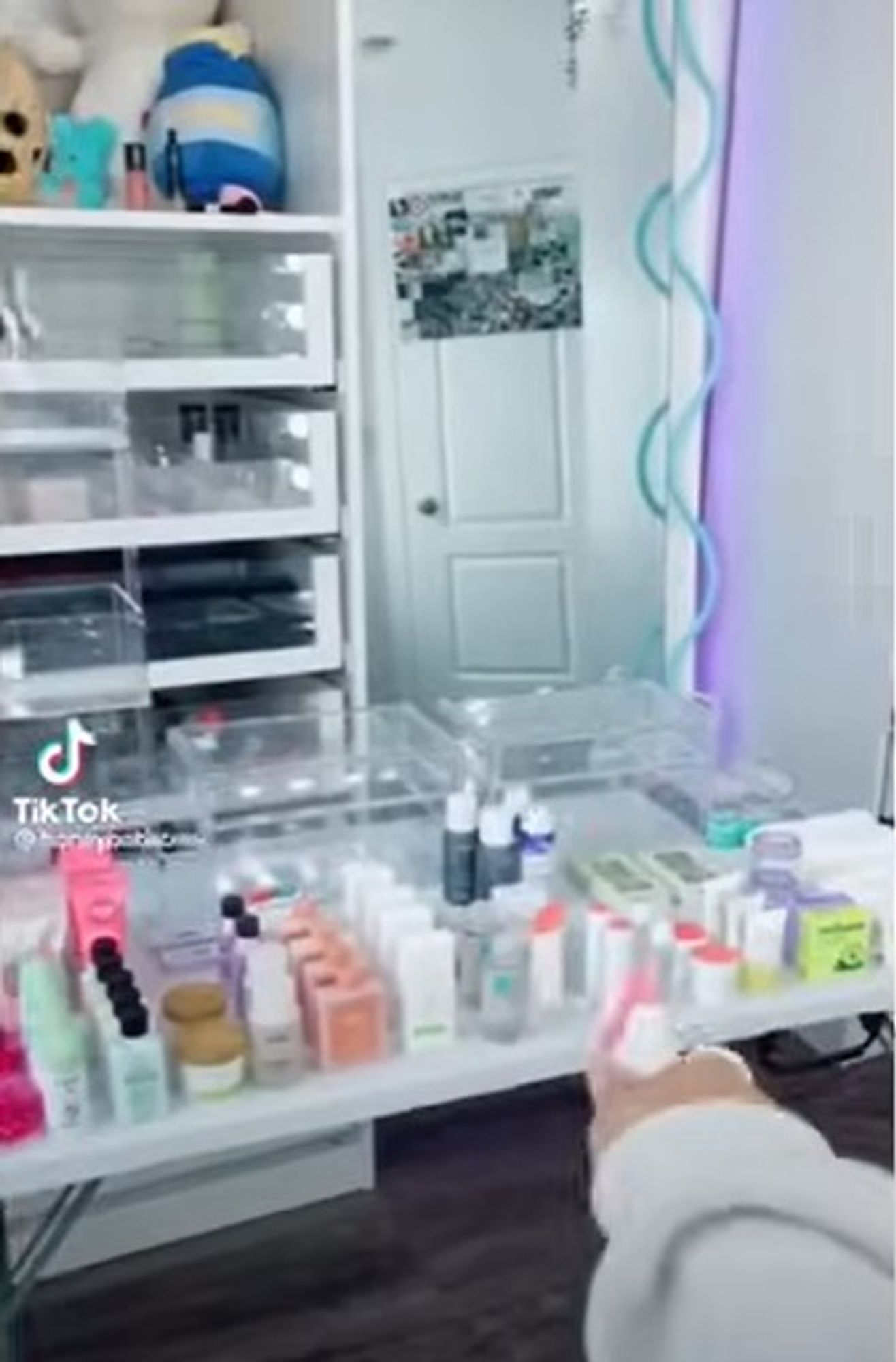 from a restock tiktok: bedroom vanity being covered in personal care supplies