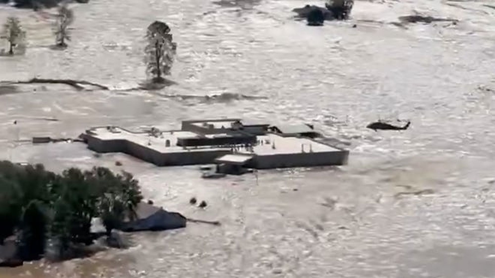 54 people stranded on the roof of Unicoi County Hospital completely surrounded by water