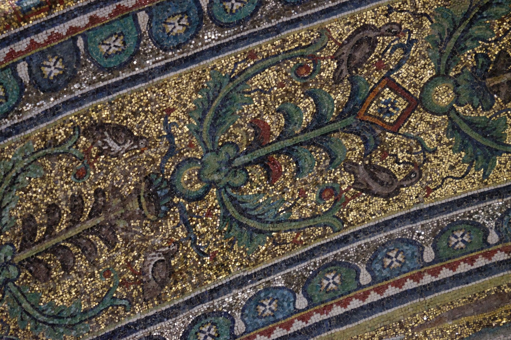 Detail of plants and birds in the soffit of Sant'Apollinare in Classe.