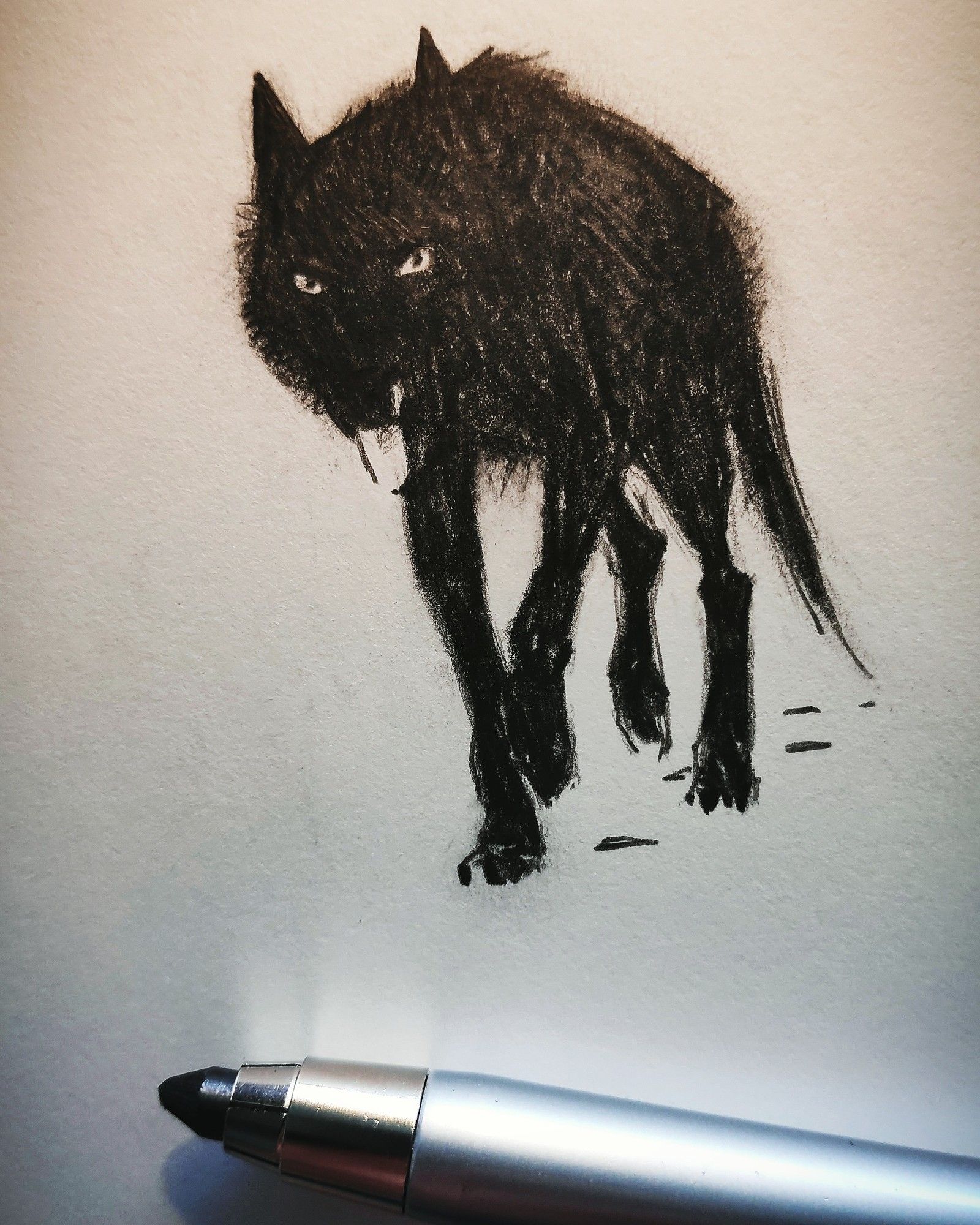 #sketch of a #blackwolf coming towards us.