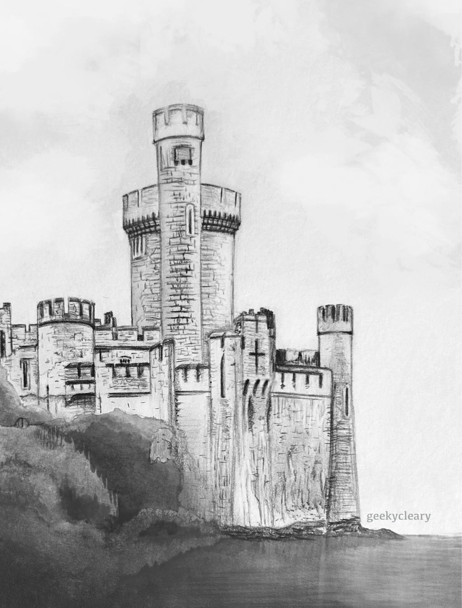 My graphite drawing study of medieval style castle in Ireland. The focus of the sketch is a towering keep made of stone bricks, with two towers surrounded by tall outer walls. There are arrow slits, protected walkways, and defensive positions throughout the structure. The right side of the castle jets out into a lake while the right side is covered in dense trees and bushes. Black and white art by geekycleary.