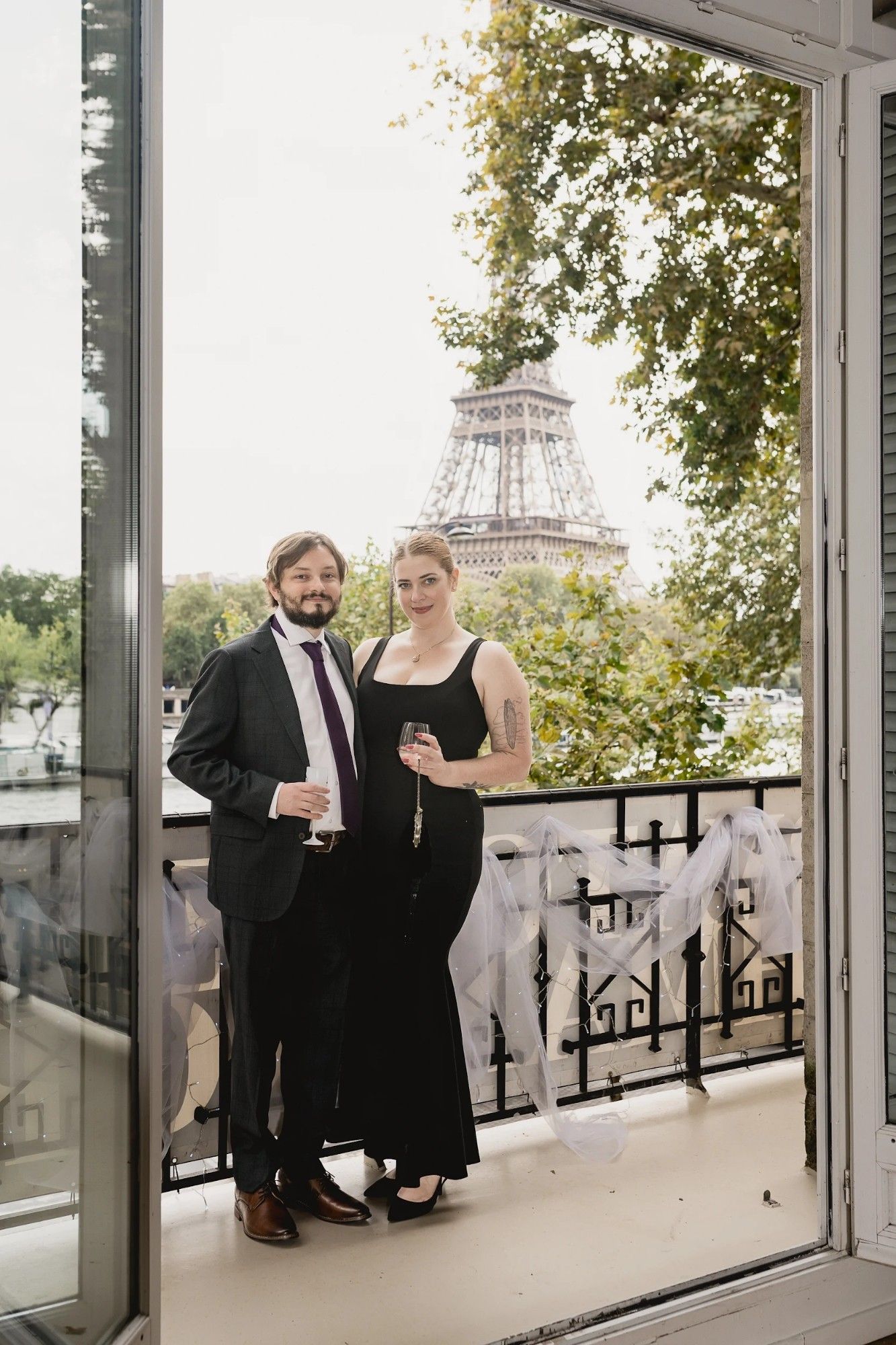 Me and my gf dressed to the nines on a balcony in front of the eiffel tower. It's a professional photo and we look stunning although unfortunately my tie was messed up