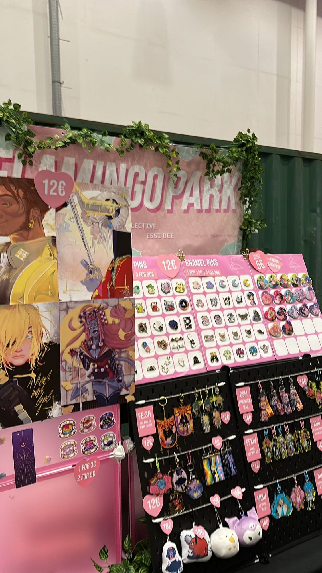 My artist alley booth filled with different merch products