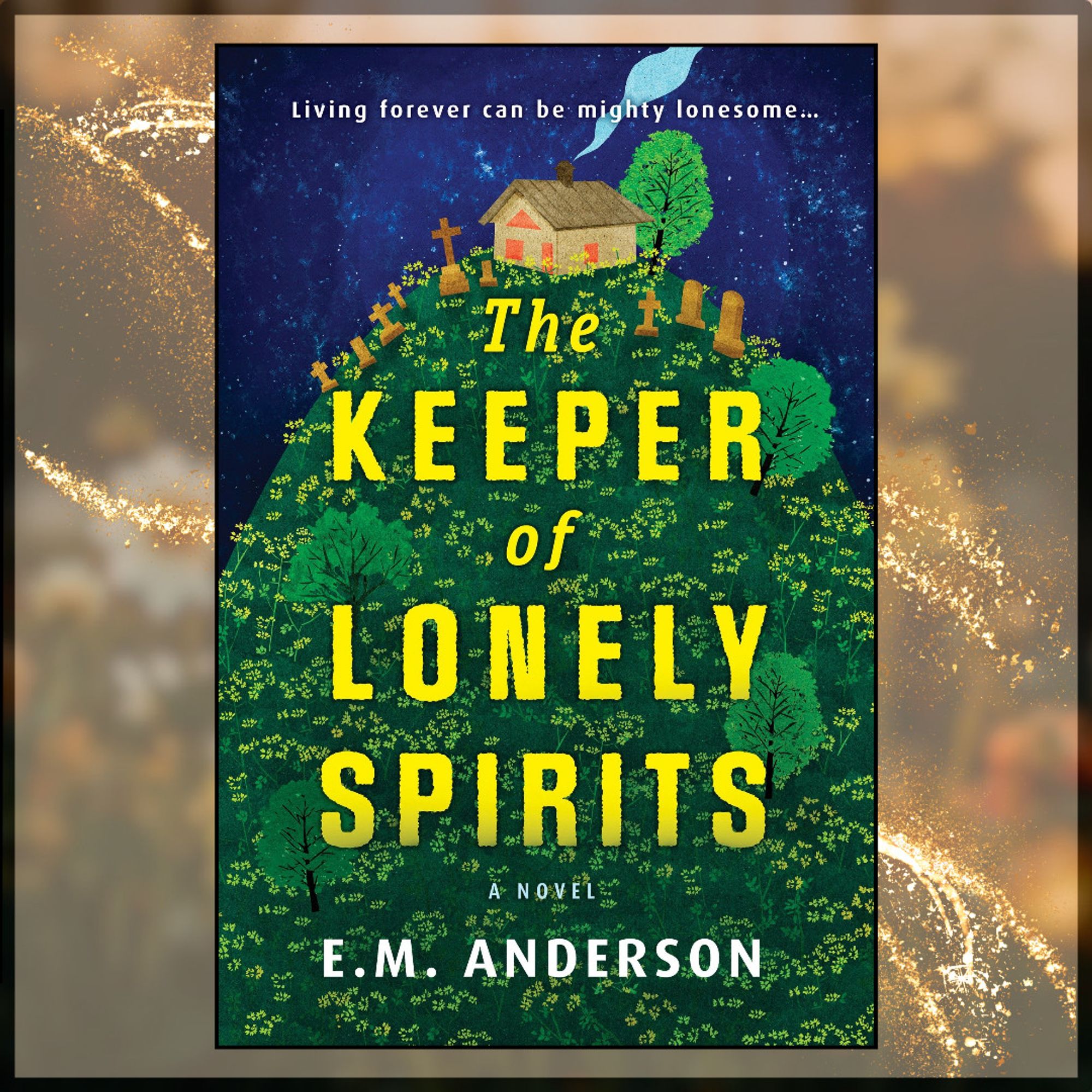 the cover of E.M. Anderson's The Keeper of Lonely Spirits over a gently blurred background of a flowery meadow in the sunset. in a style that gives the impression of paper art, a small brown cottage sits at the top of a tall, green hill rife with small yellow flowers and sprinkled with trees. the cottage windows and doorway are orange with light, and blue smoke drifts gently from the chimney. at the top of the hill, clustered around the cottage, are tombstones and crosses. large yellow sans-serif text with torn edges is centered over the image, reading "The Keeper of Lonely Spirits." smaller, white sans-serif text below reads, "A novel. E.M. Anderson."