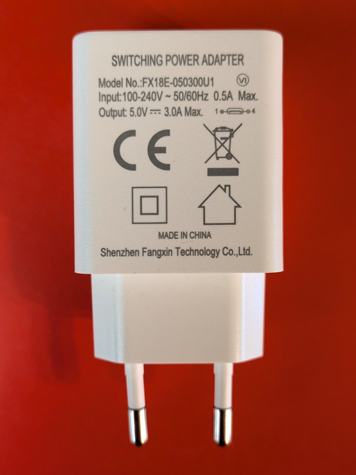 Type C wall power adapter, with two round prongs as opposed to the conventional Type A adapter seen in North America