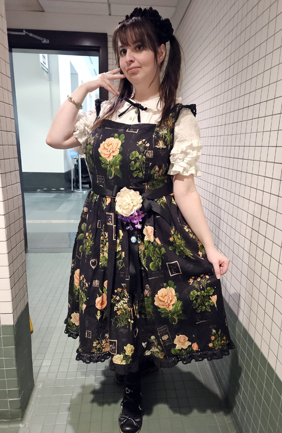 ya girl wearing a long lolita dress printed in full bloom flowers