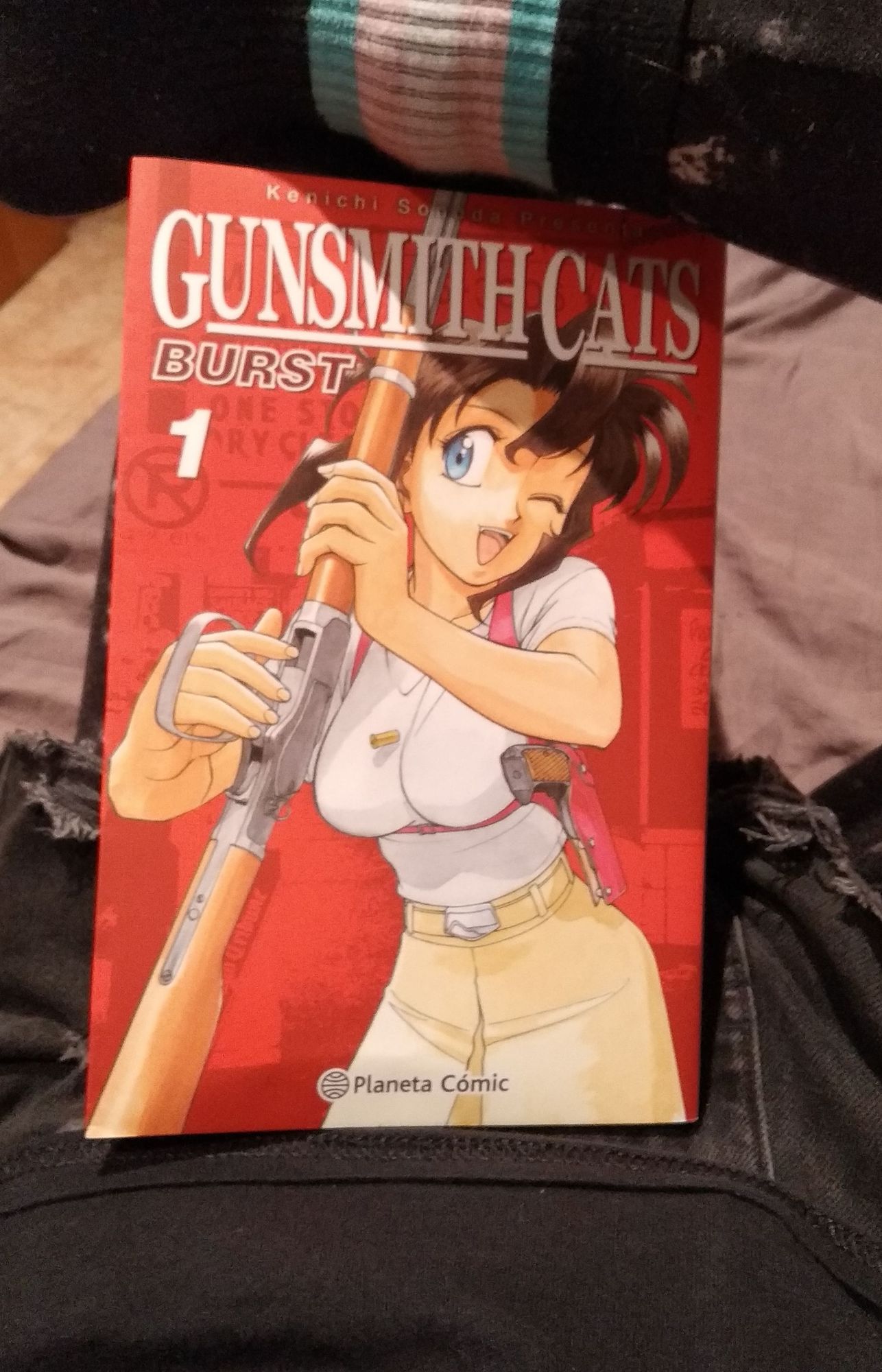 A copy of Gunsmith Cats, fitted between my trans socks and my shorts