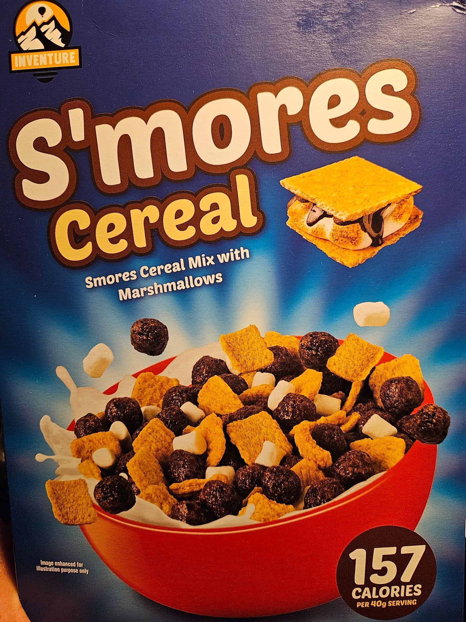 photo of the front of the "breakfast cereal" box, it consists of three different shapes/tastes meant to be the components of smores