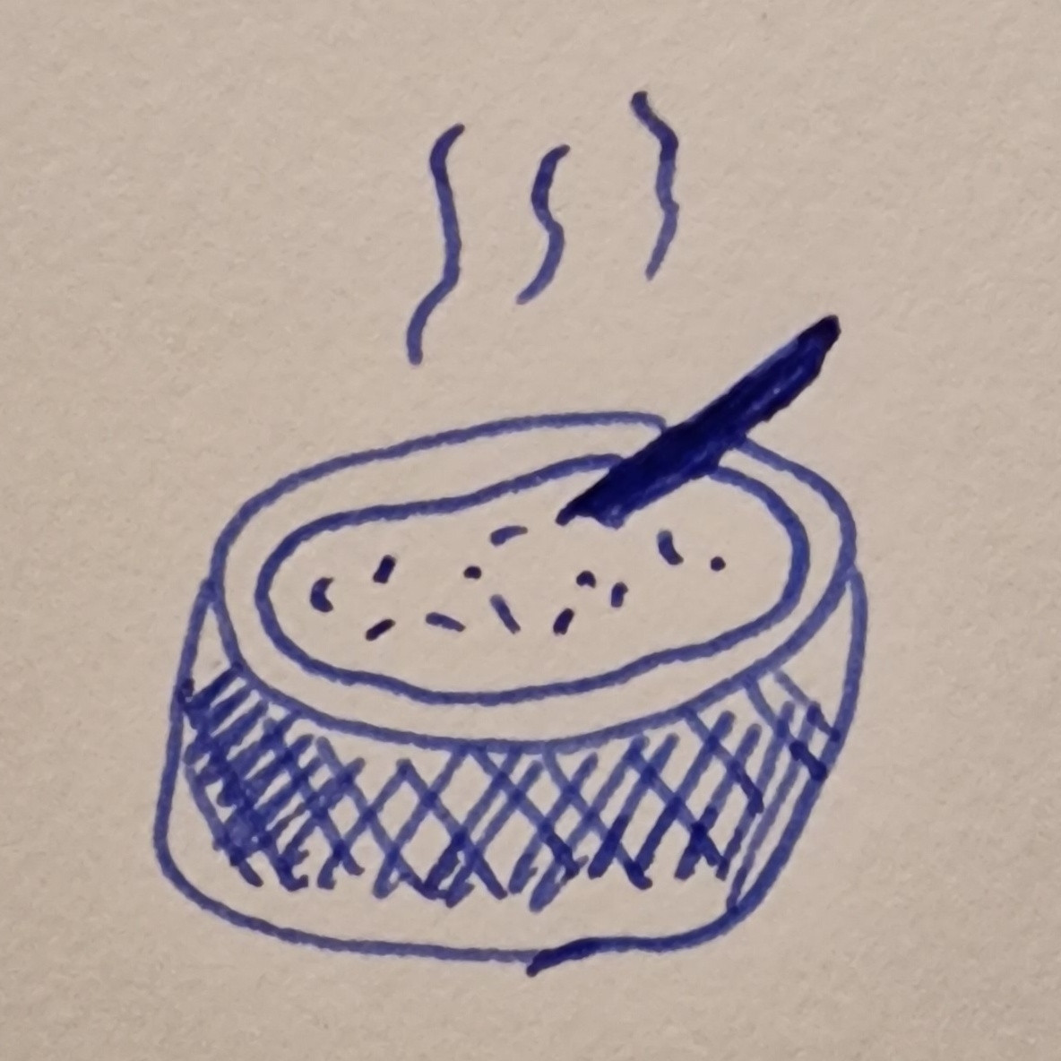 A crappy drawing in blue ink of what's supposed to be a bowl of soup with a spoon sticking out to the left and steam rising. 