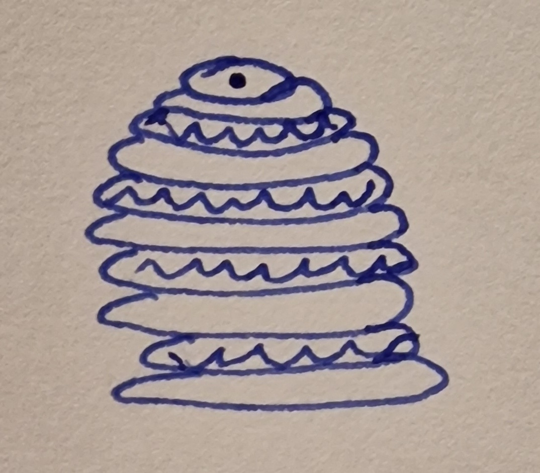 A crappy picture in blue ink of a circulate layer cake. It might be a stack of pancakes with whipped cream or something in between... Or not. It was at risk of looking like the poop emoji but I managed to salvage it.