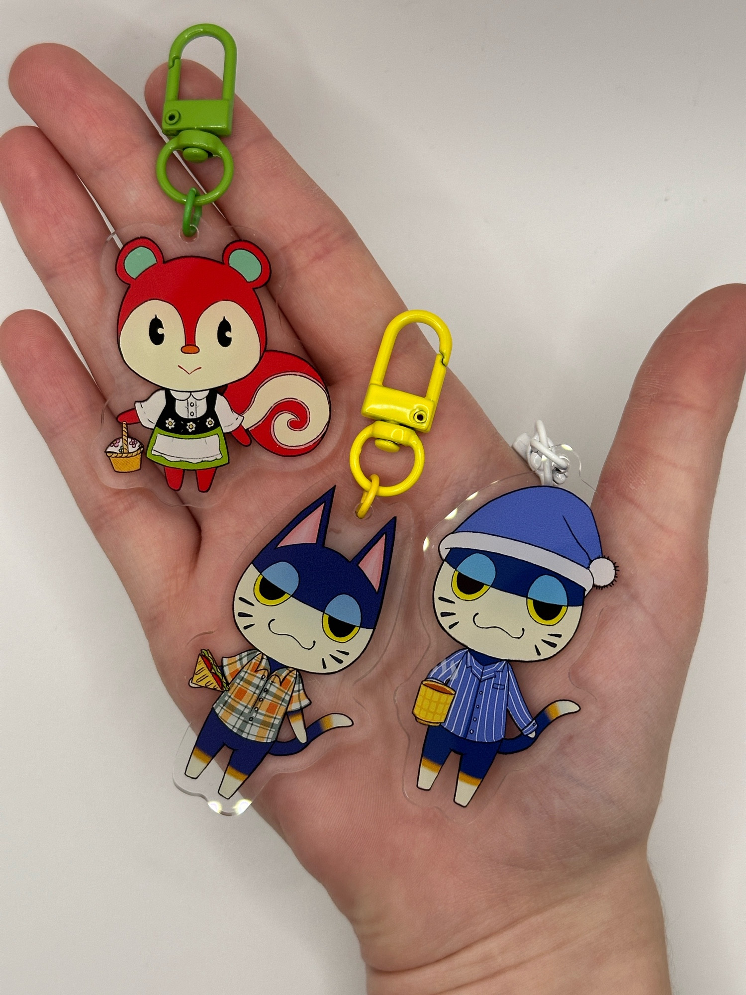 Animal crossing keyrings; Poppy the squirrel punchy the cat and punchy the cat in pyjamas