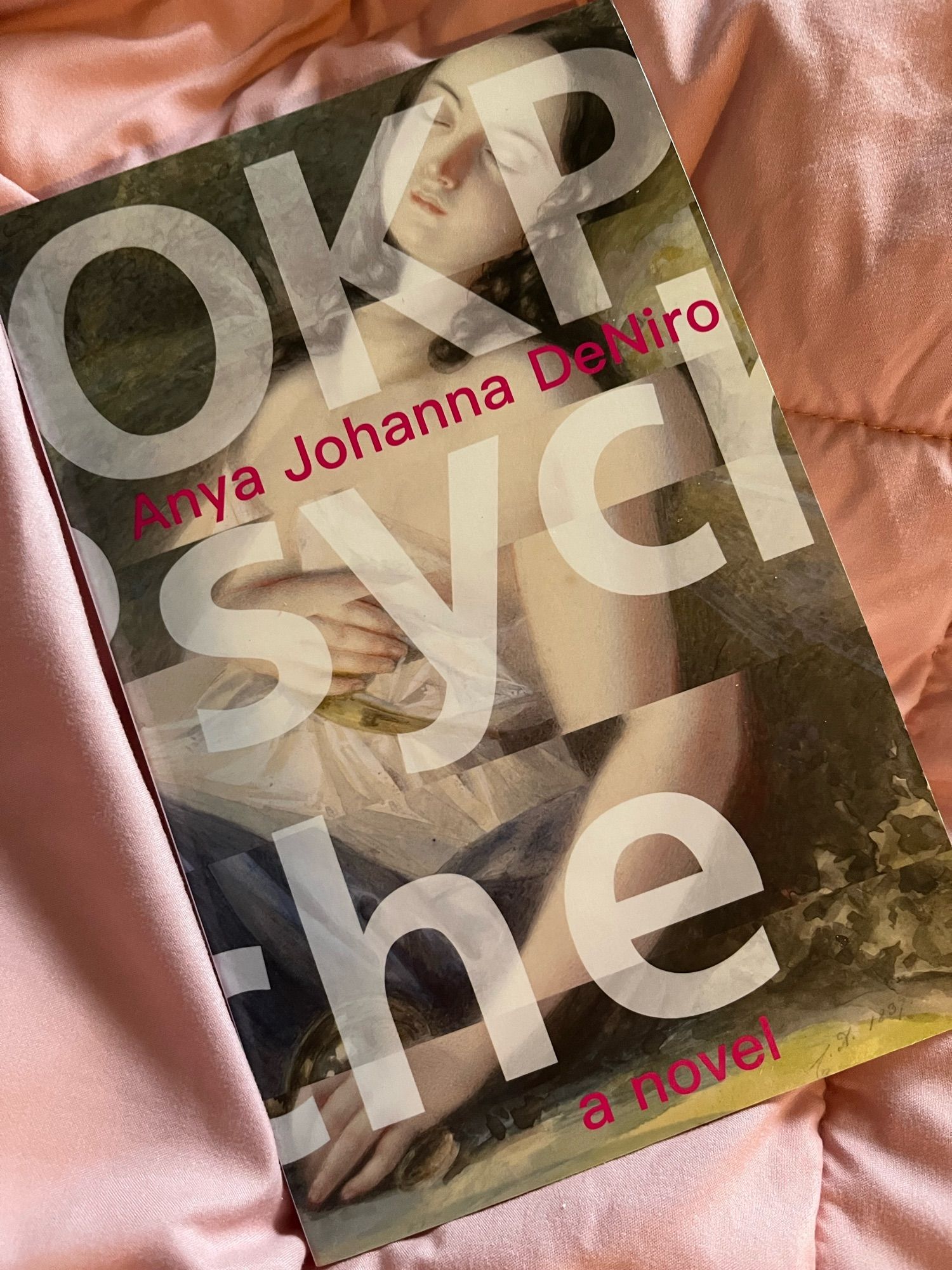 OKPsyche by Anya Johanna DeNiro.  Cover has a partially nude fainting white woman in the renaissance style