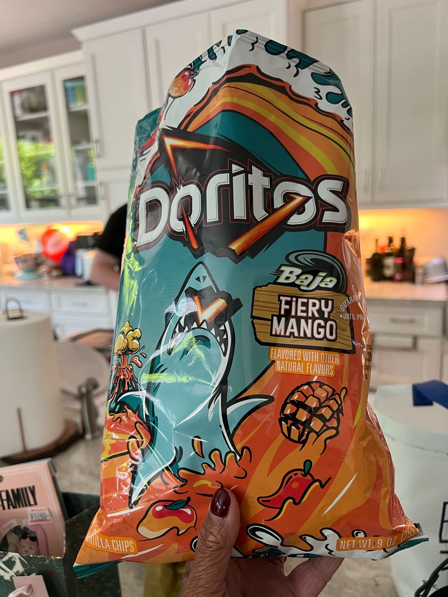 Bag of Doritos Baja Fiery Mango chips. The pictures evokes feelings of hunger and dread in equal parts.