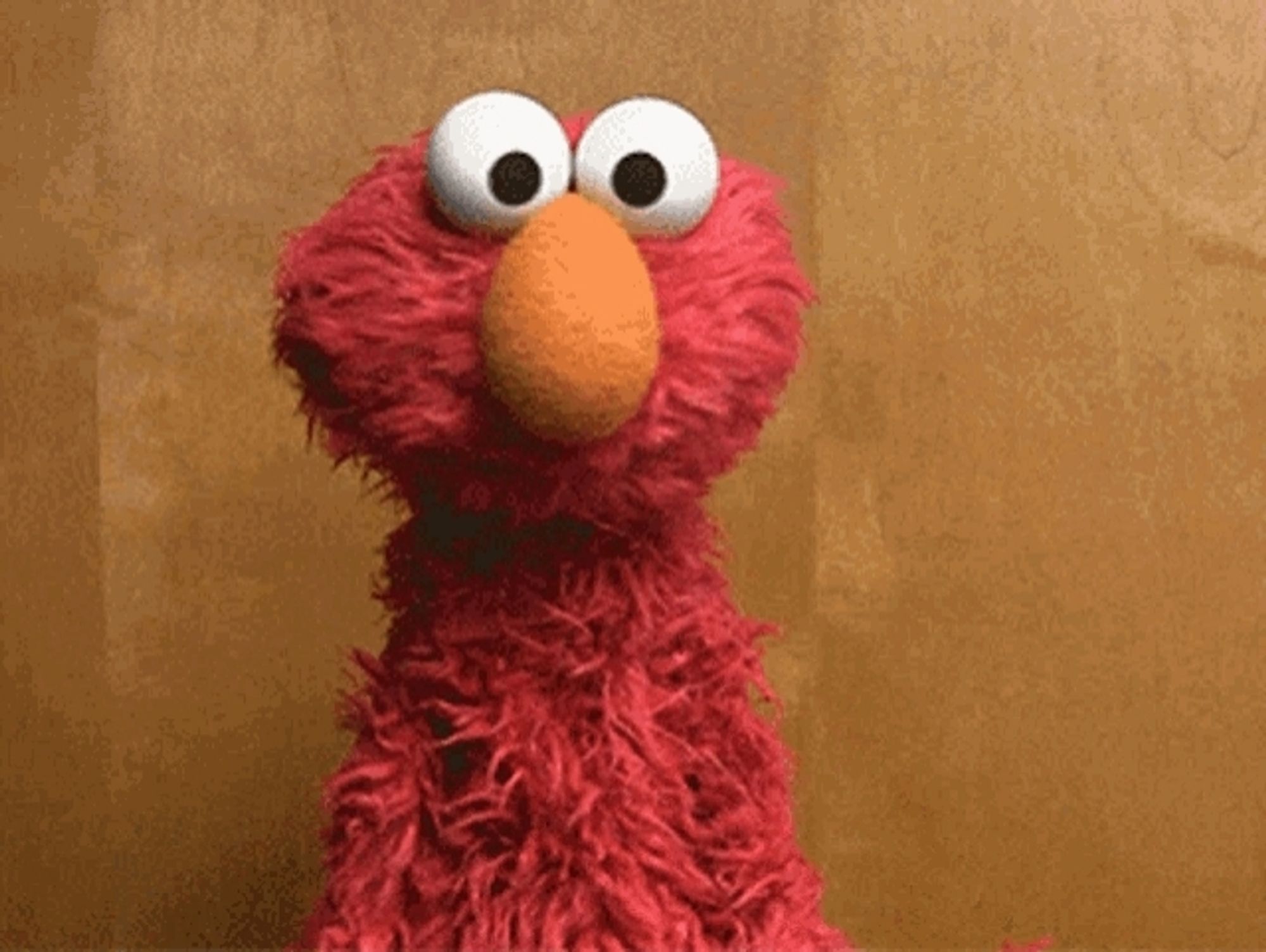 Elmo shrugging