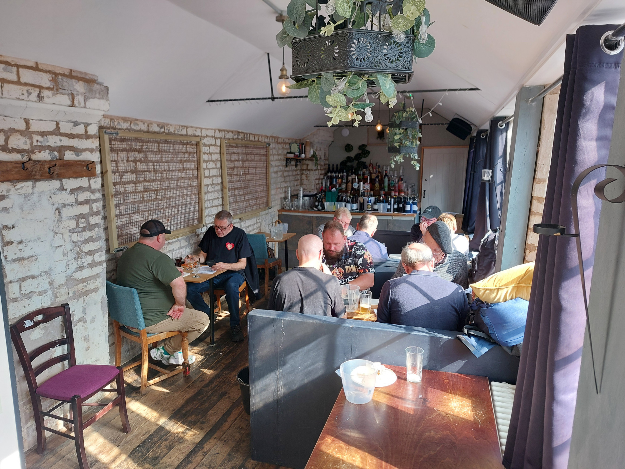 Homebrewers judging beers at a competition