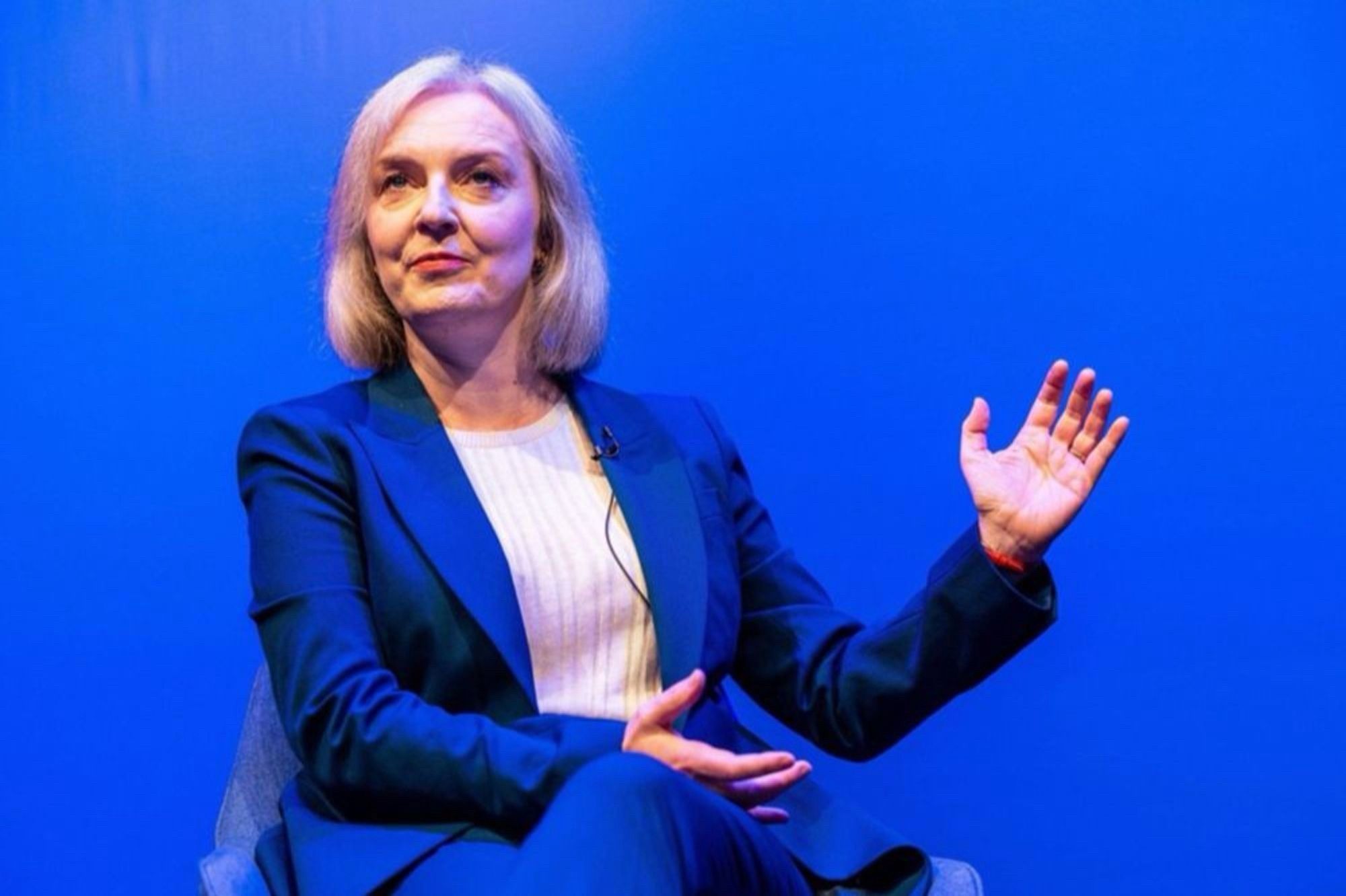 Liz Truss looking like a human statue