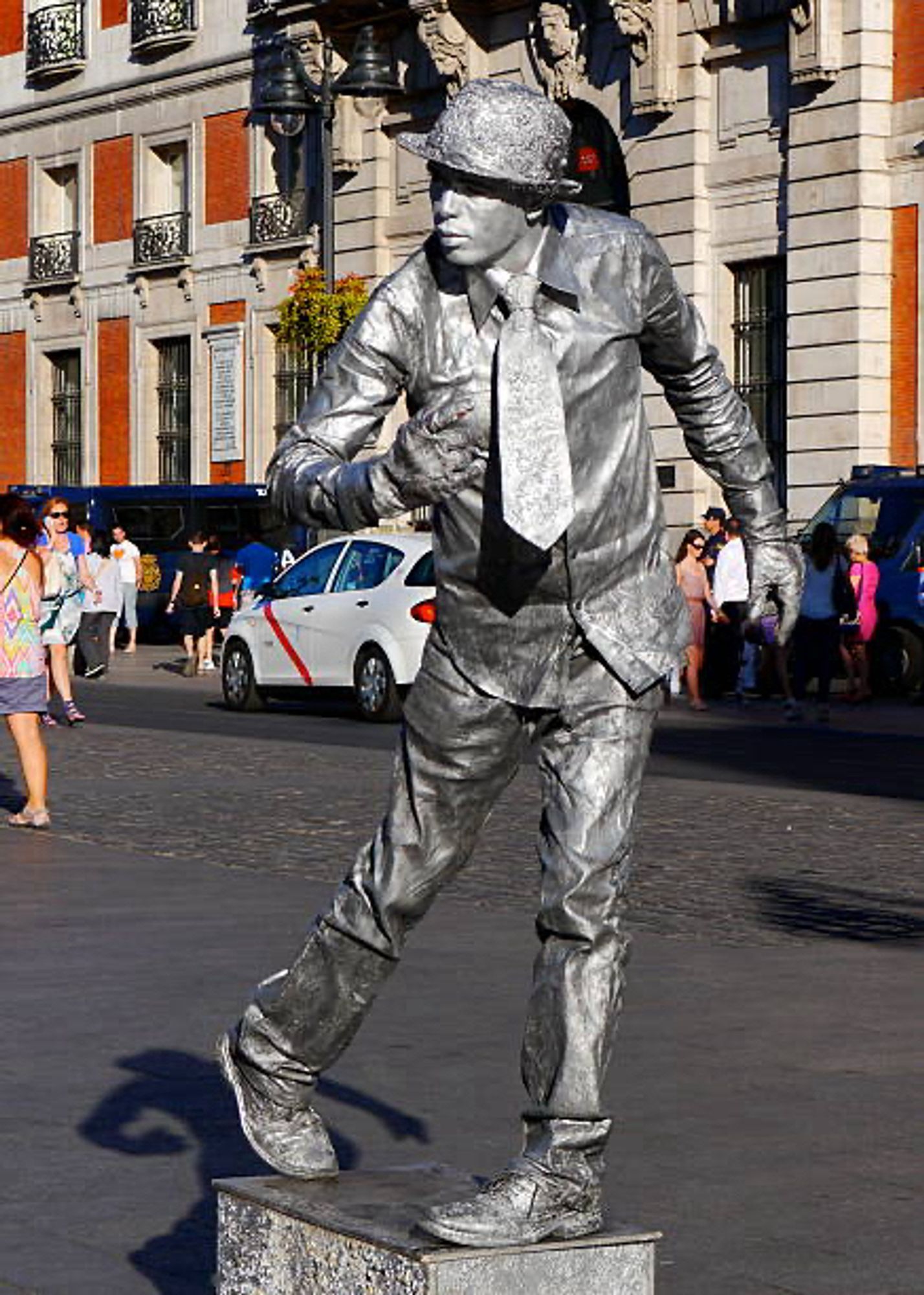 Human statue street performer