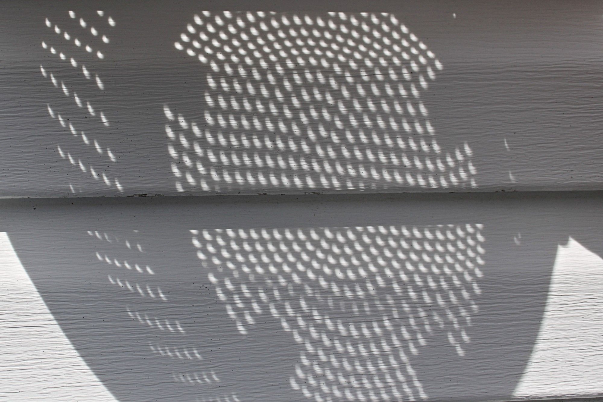 Partial Eclipse through a colander