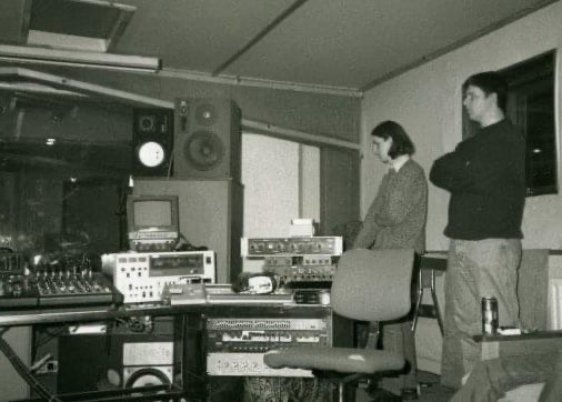 Black and white pic. We’re both on the right in knitwear. I have long hair, he doesn’t.