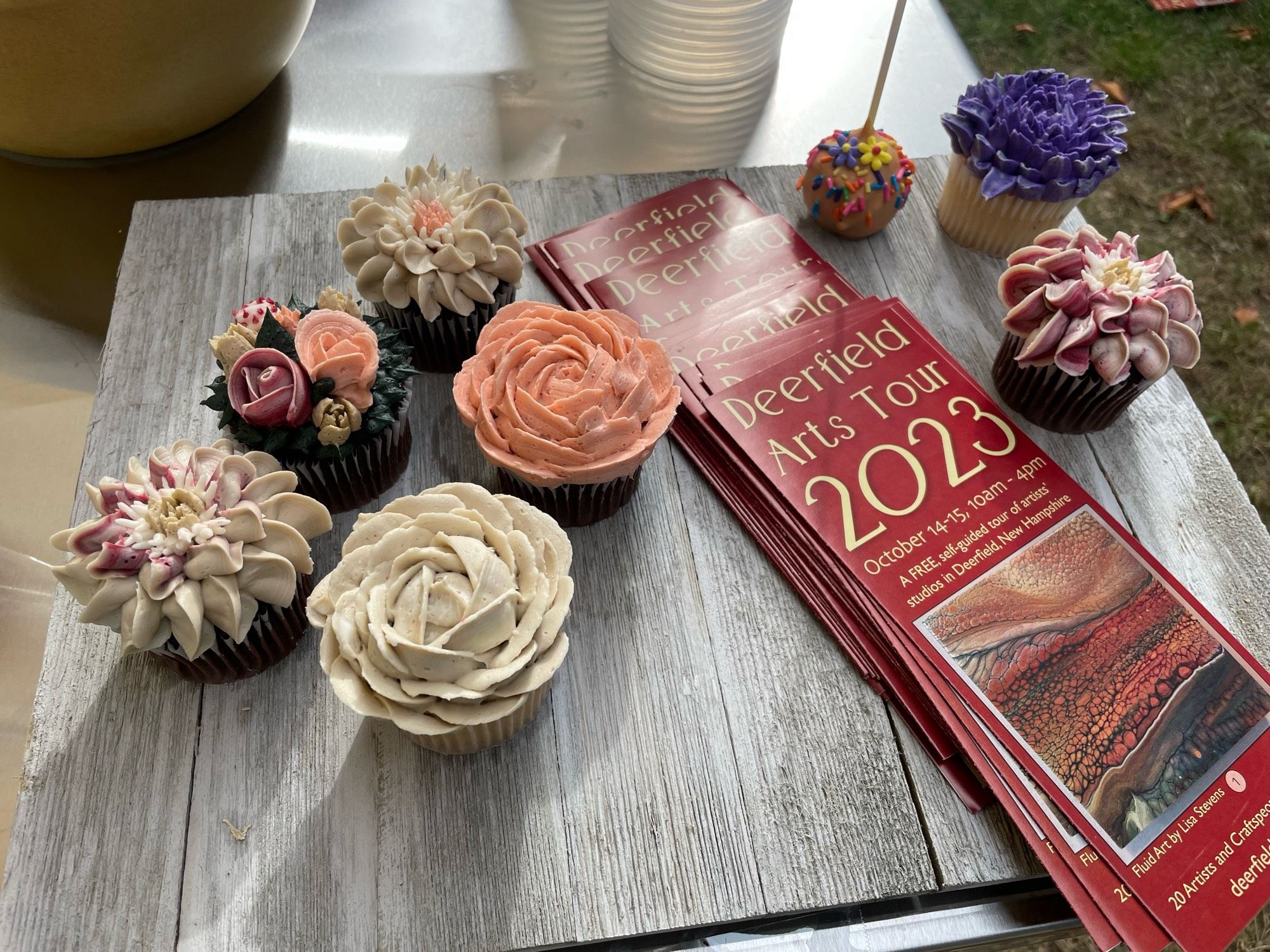 Botanical themed cupcakes that look like flowers and cacti