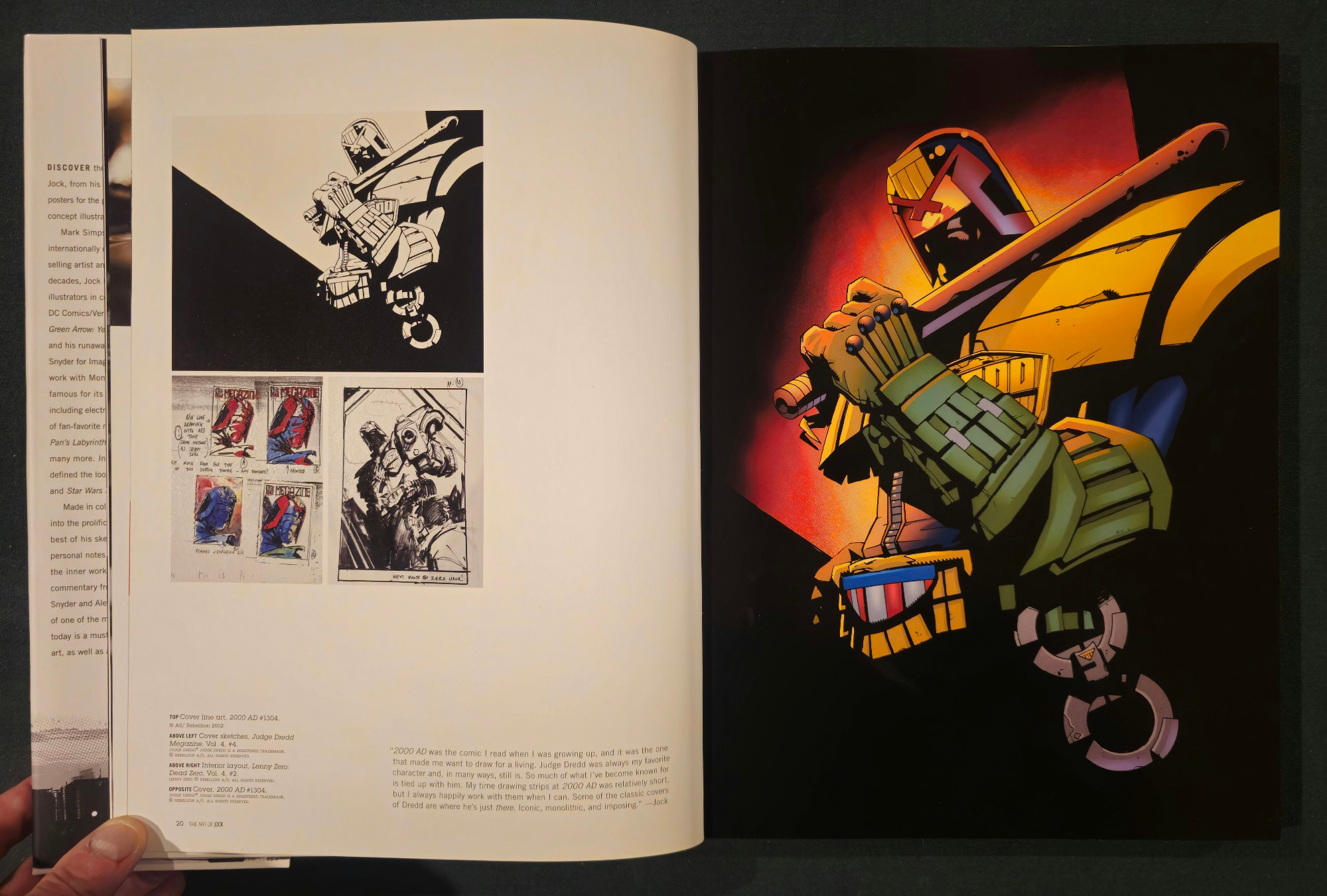 On the left, the line drawing for a Judge Dredd  over  some cover sketches, and a preliminary drawing for an interior page.

The text reads:

"2000 AD was the comic I read when I was growing up, and it was the one that made me want to draw for a living, Judge Dredd was always my favorite character and, in many ways, still is. So much of what I've become known for is tied up with him. My time drawing strips 2000 AD was relatively short, always happily work with them when I can. Some of the classic covers of Dredd are where he's just iconic, monolithic, and imposing

On the right, a colored version of the line drawing, featuring Judge Dredd resting a bat on his shoulder.