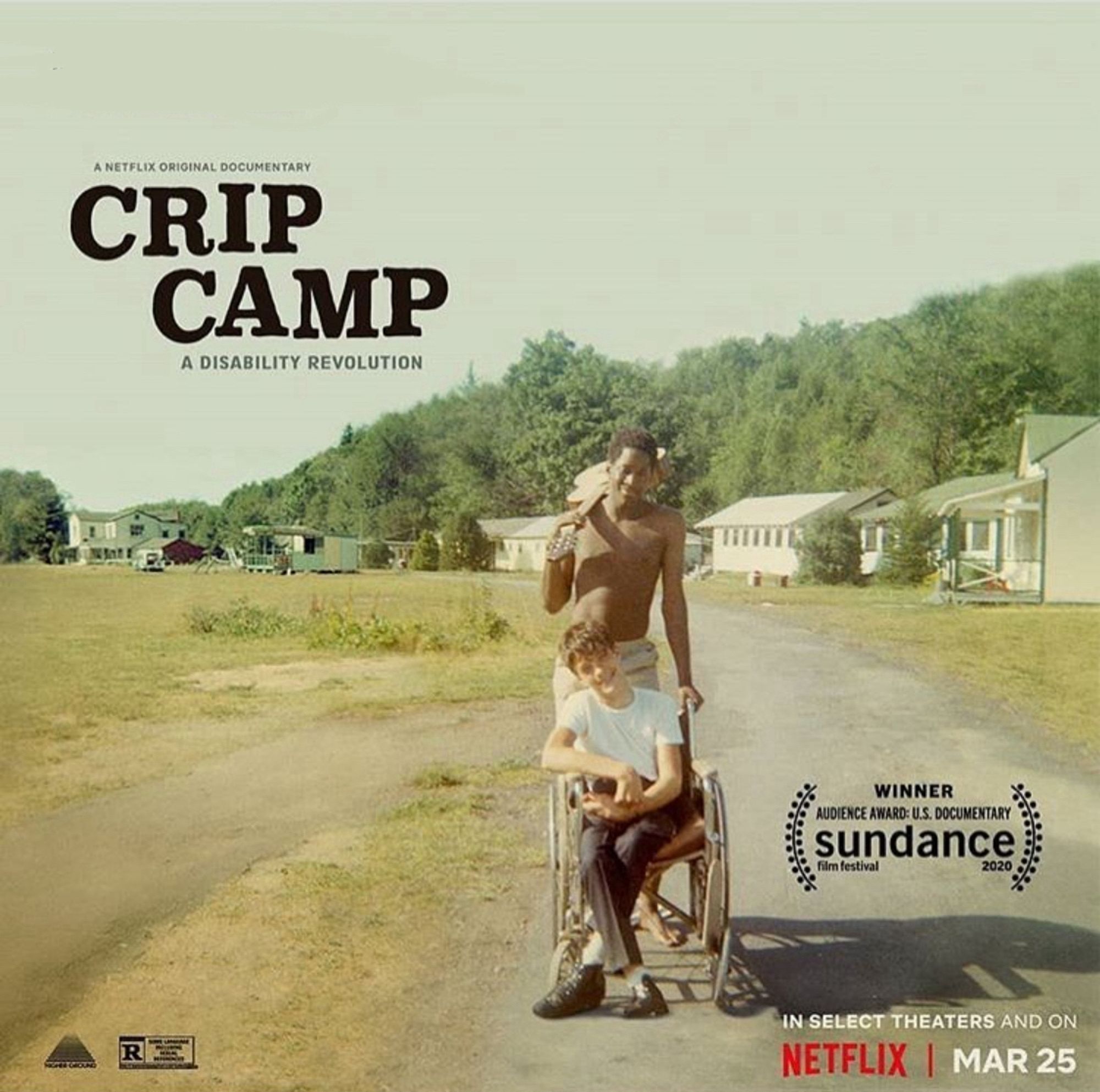 Crip Camp movie poster: A color
1968 snapshot taken at Camp Jened shows Neil Jacobson, a young White teen, sitting in his manual wheelchair. Behind him with one hand on Neil's chair stands Alan Ford, a young Black man with a guitar slung over his shoulder. The poster text reads: "A Netflix Original Documentary, CRIP CAMP, A Disability Revolution. In select theaters and on Netflix March 25. Winner Audience Award U.S.
Documentary Sundance Film Festival 2020."]