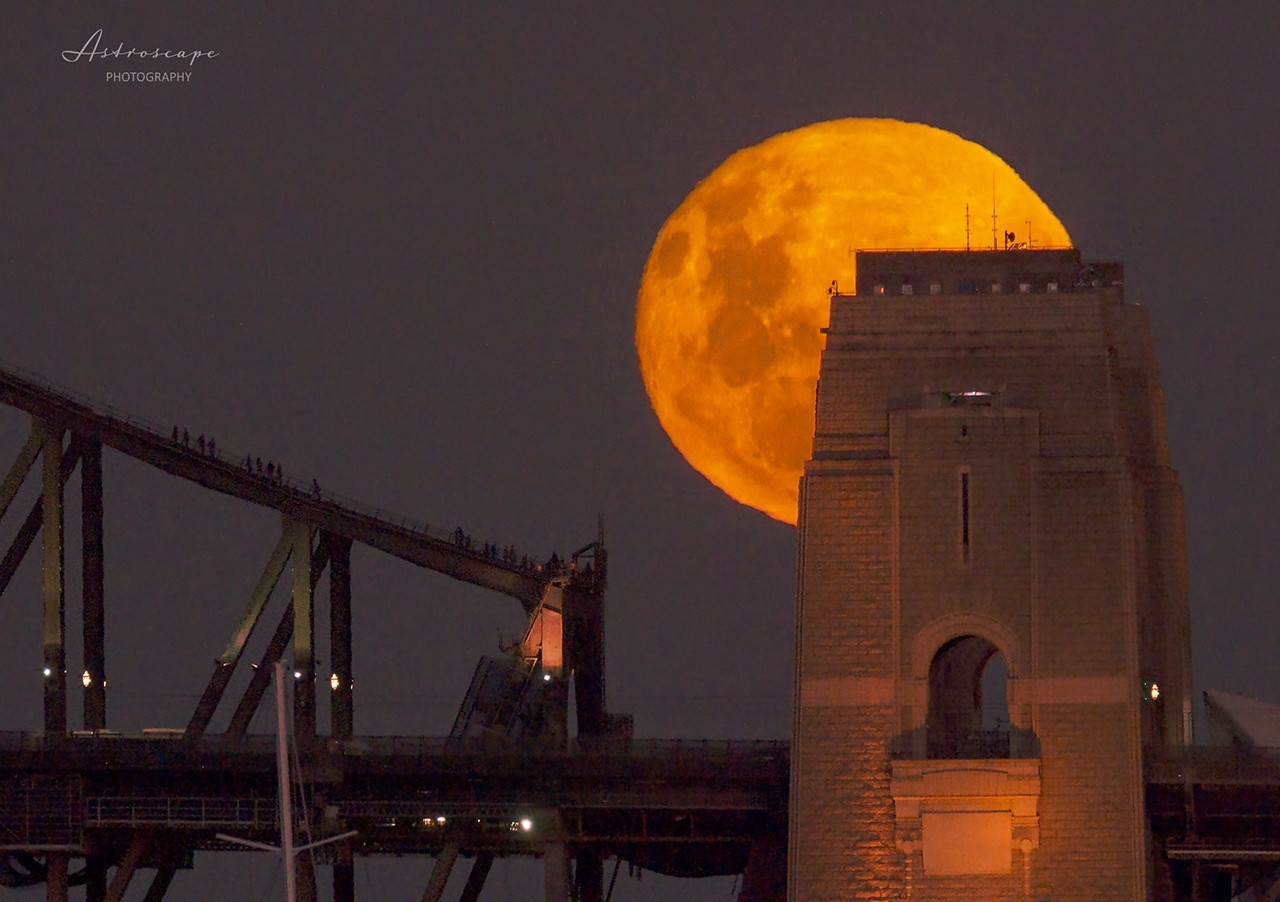 A single exposure of the full moon rising behind the southern pylon of the Sydney Harbour Bridge. Two groups of bridge climbers can just be seen.
Taken with a Pentax K-5 DSLR, Astrotech ED65 refractor & Televue 2x Powermate .