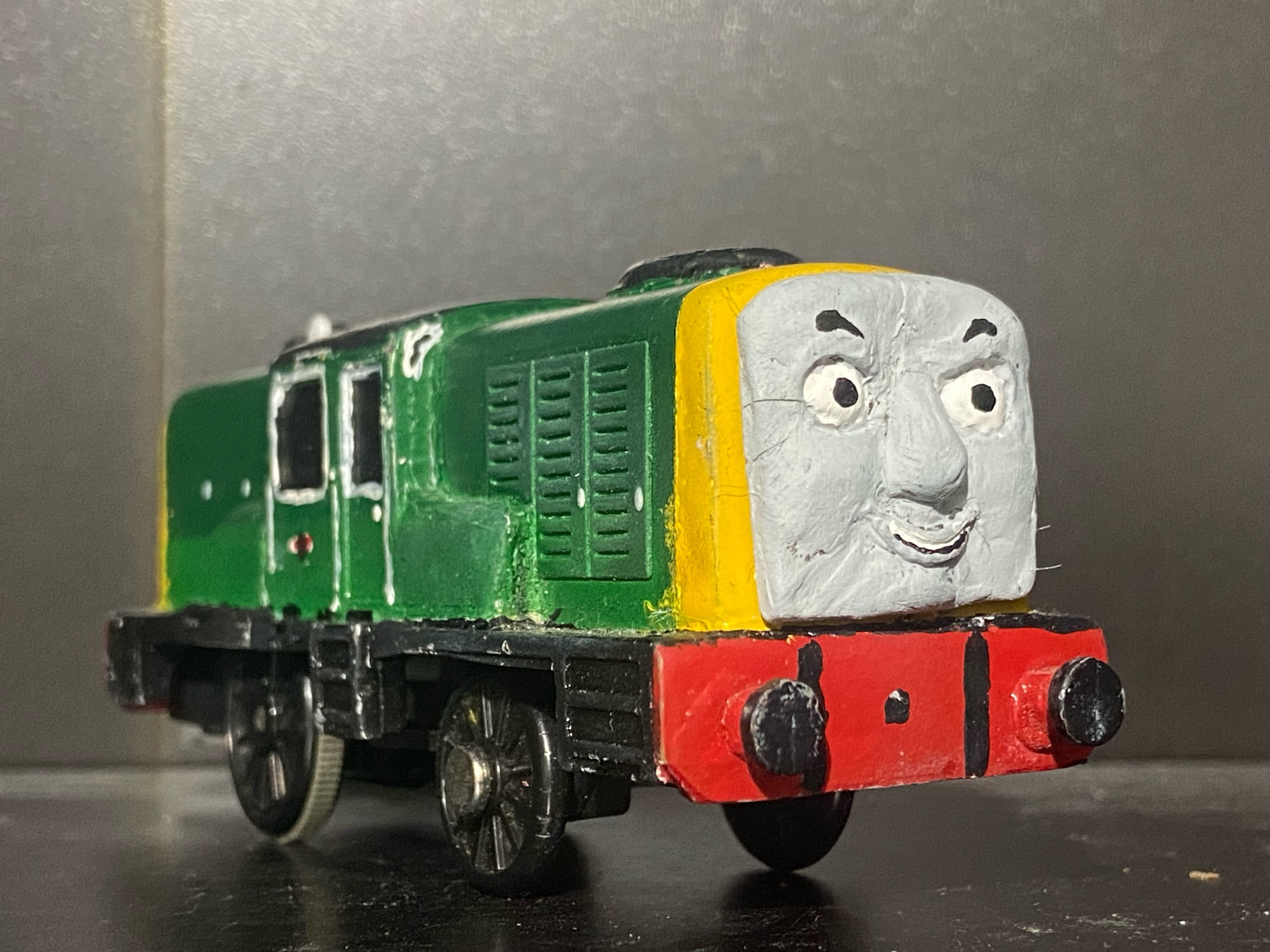 Side profile of Derek. His green bodywork is now visible.