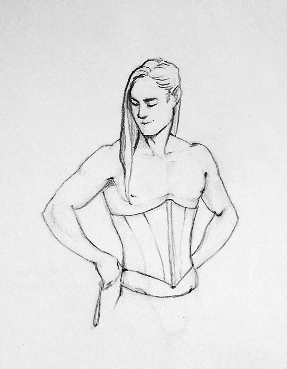 A long-haired guy puts on a corset.