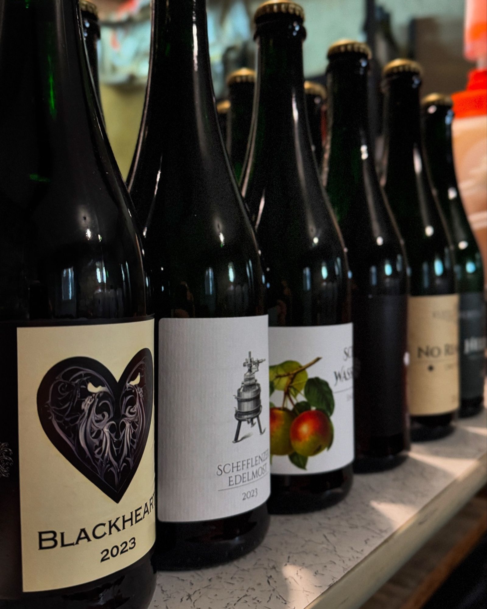 Six bottles of Kertelreiter cider and Perry. 
Blackheart 2023
Schefflenzer Edelmost 2023
And the other labels are out of focus