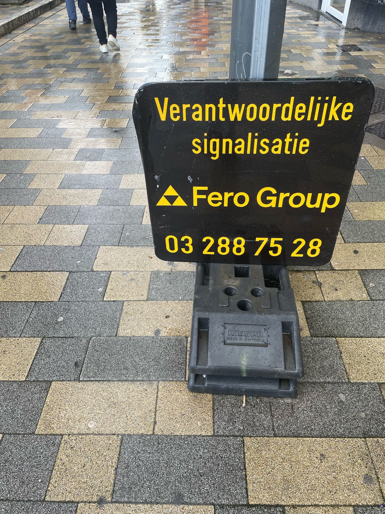 sign for a construction group “Fero Group”. their logo looks like the triforce