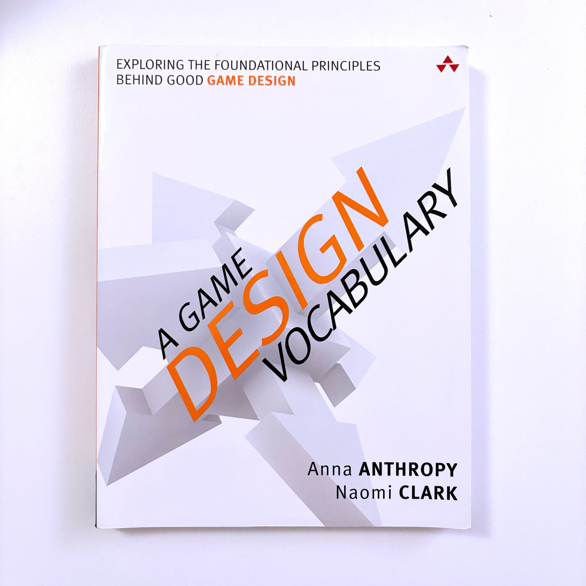 The book “A Game Design Vocabulary” by Anna Anthropy and Naomi Clark. 