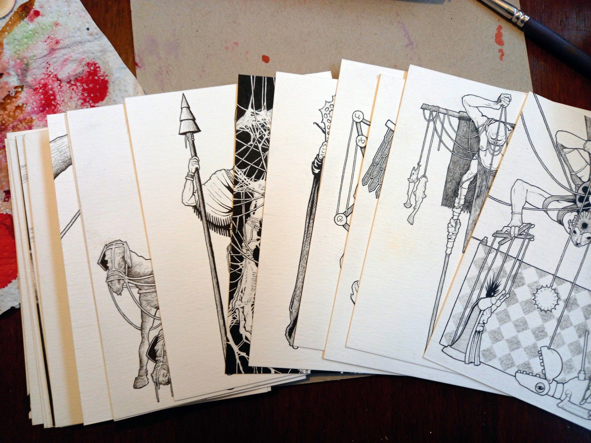 Dozens of A5 sized card with detailed black and white ink drawings