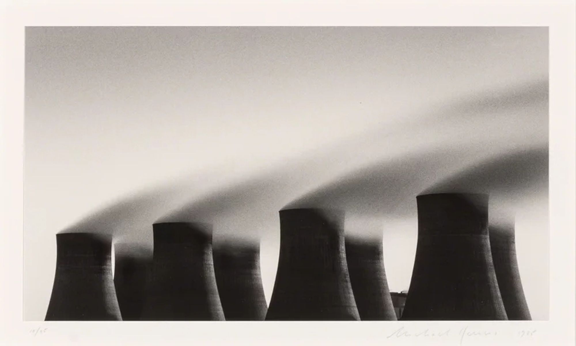 Black and white long exposure photograph showing steam coming from the cooling towers of Ratcliffe Power Station; the last coal power station in Britain which closed today. Michael Kenna.