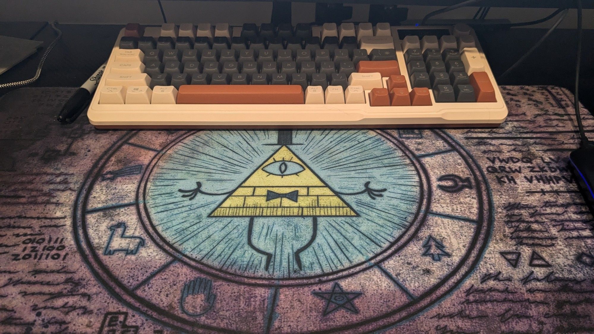 Bill Cypher on a desk mat