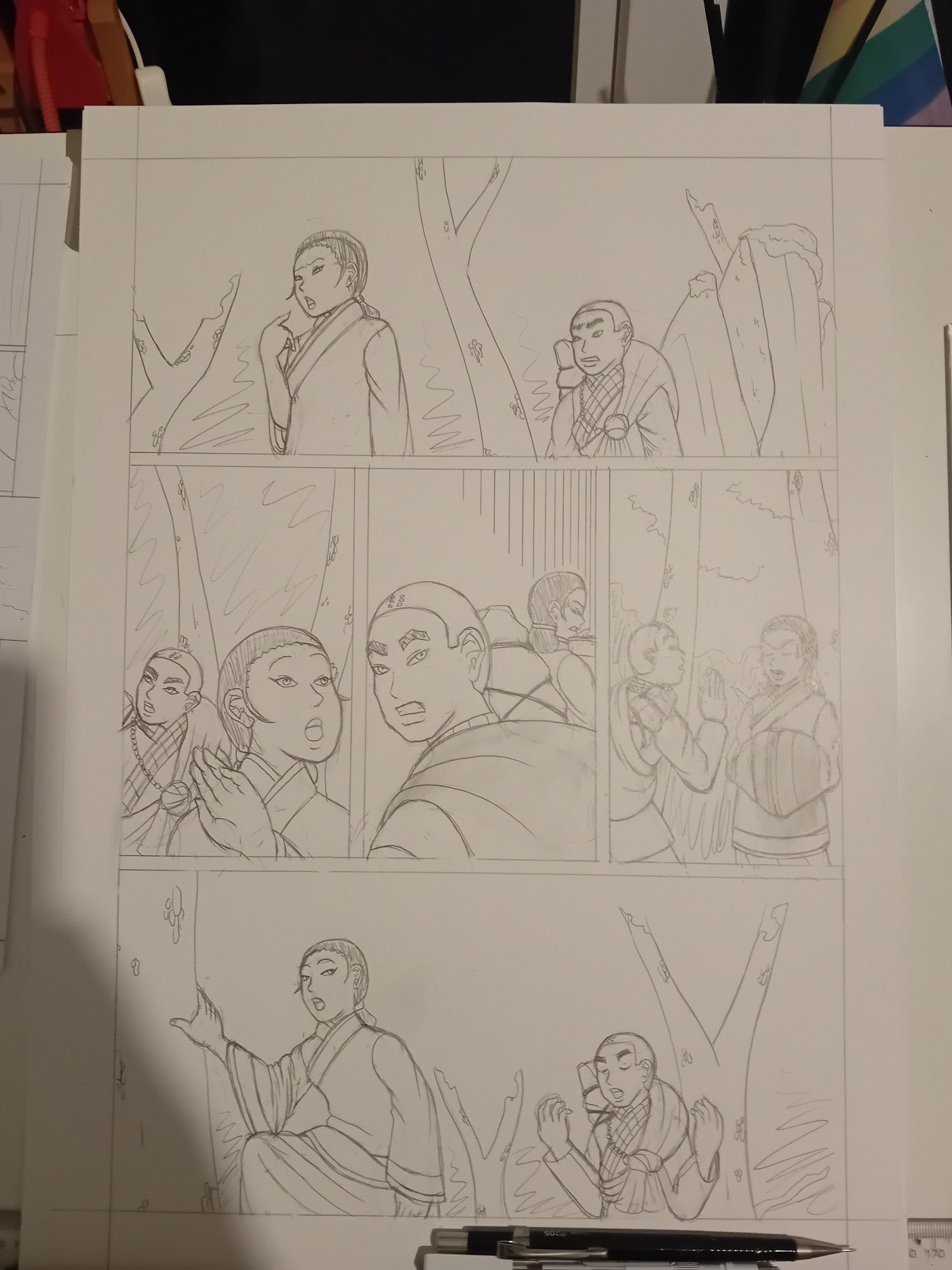 A page of comic pencils. A young woman stops and hears something in the forest, but the monk travelling with her cannot.