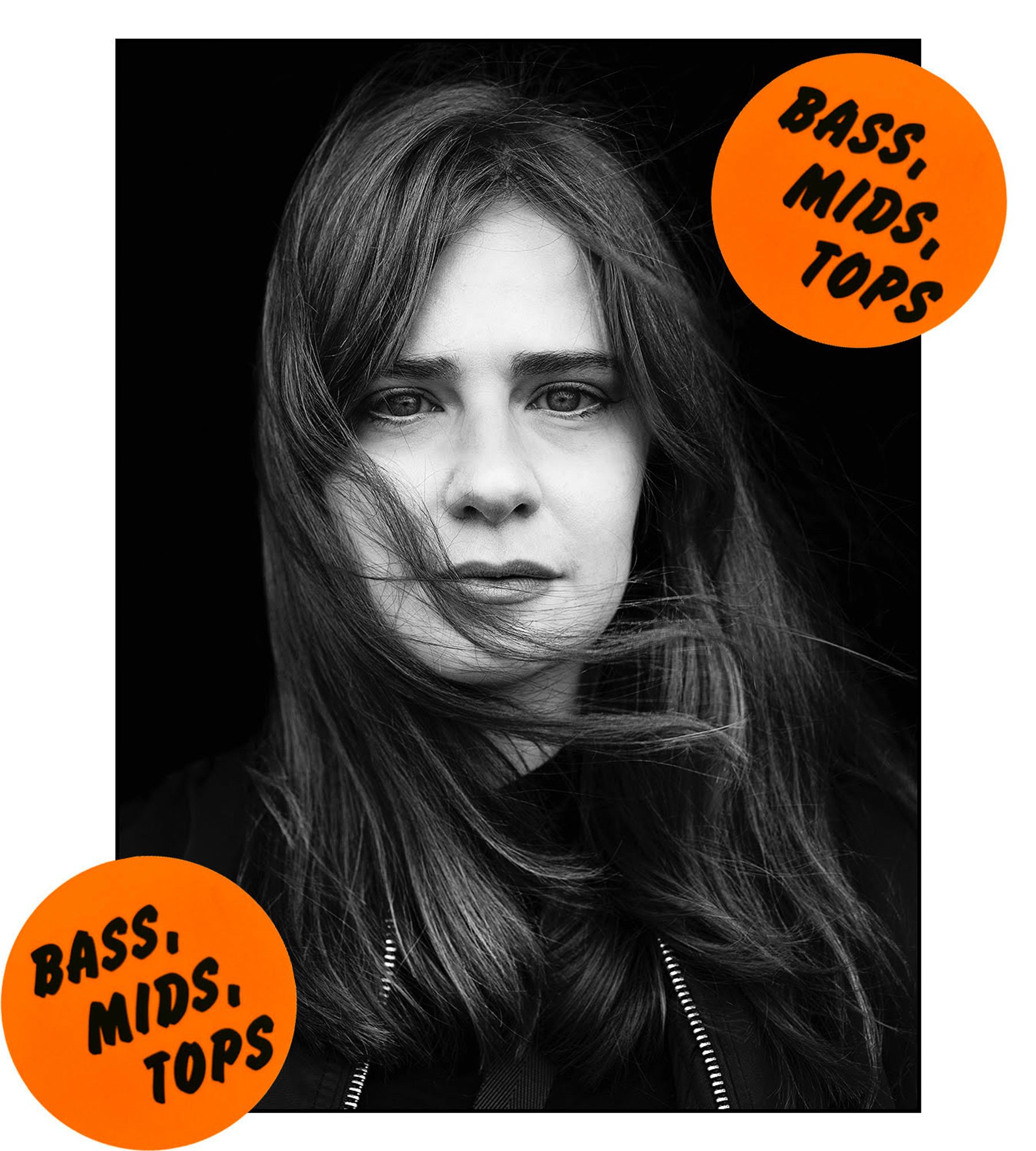 photo of Lara Rix-Martin by Brian David Stevens in black & white, hair blowing across face, wearing a zipped leather jacket - there are orange "BASS, MIDS, TOPS" 'stickers' on opposite corners of the picture