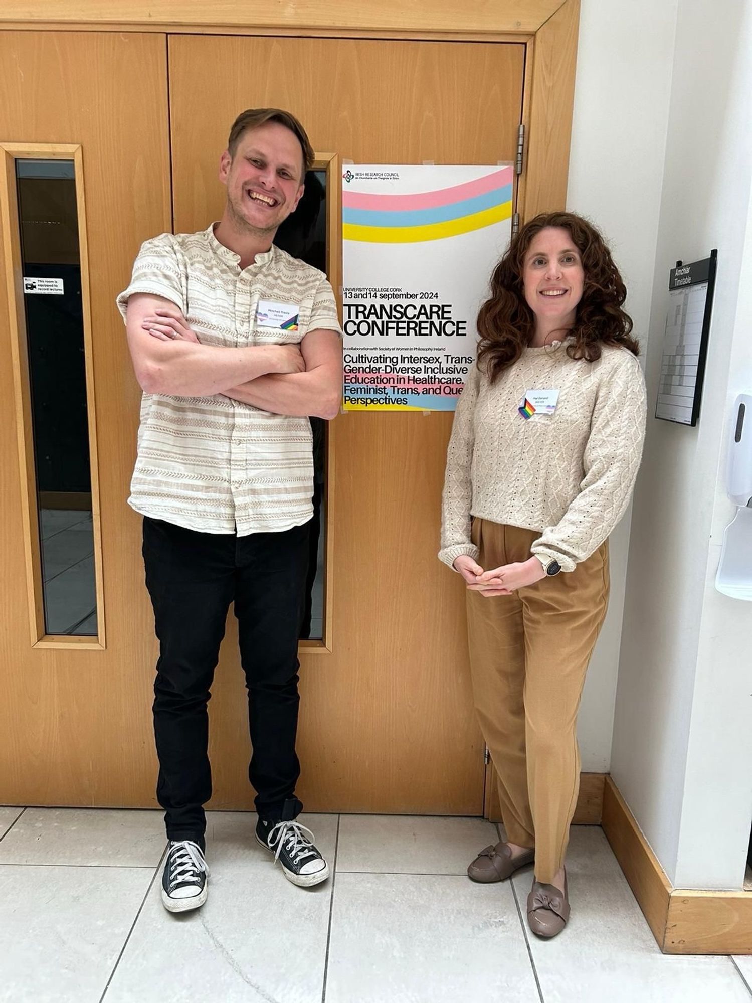 Fae and I by the conference poster. Fae looks like a Wallace and Gromit character somehow.