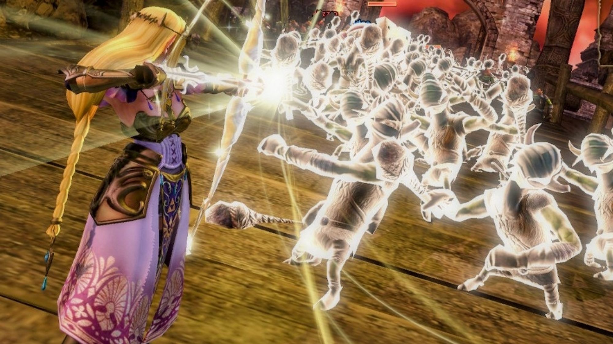 Princess Zelda firing a light arrow through a horde of bokoblins