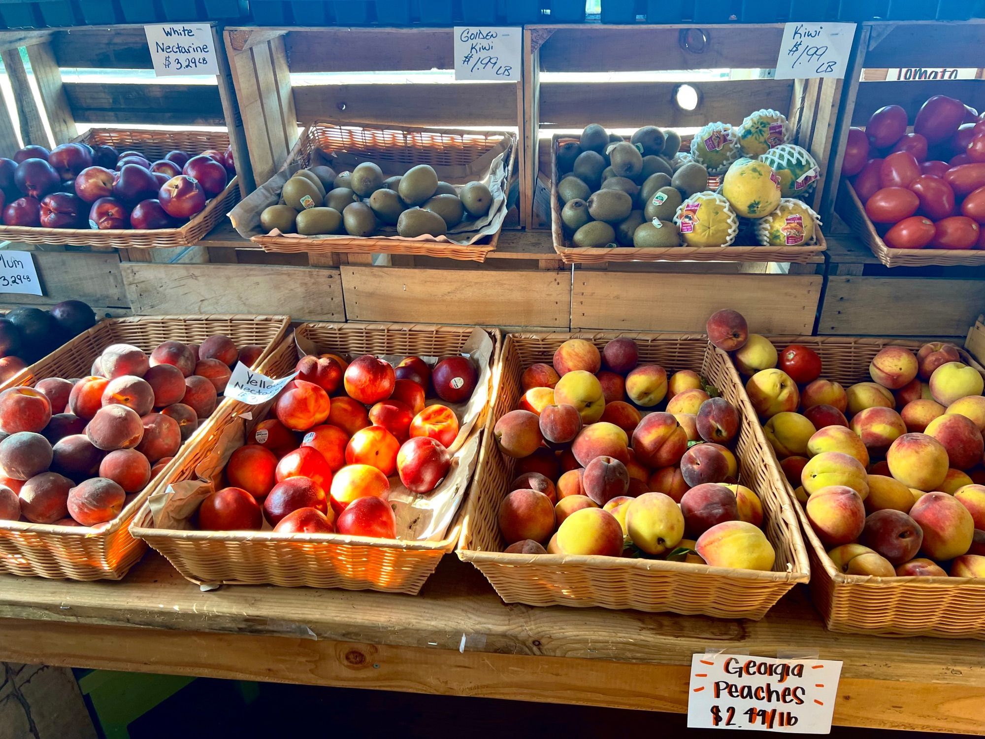 Kiwifruit priced $1.99 per pound versus colourful and delicious fruit including Georgia peaches at $2.99 per pound.