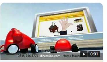 Screenshot of a Direct Line advert. There is a big red phone with wheels, next to a small red mouse with wheels.