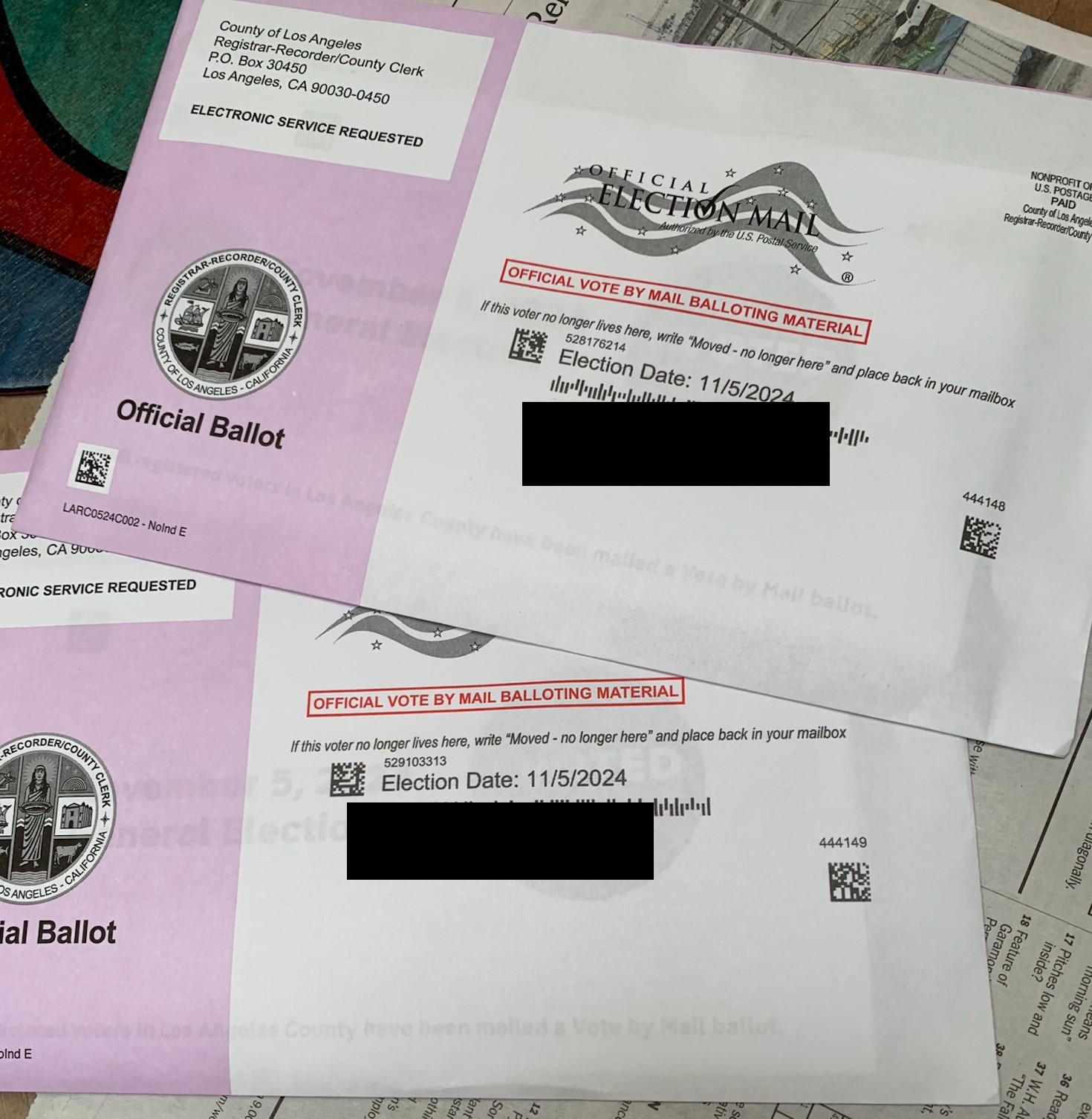 photo of two mail-in ballots for LA County