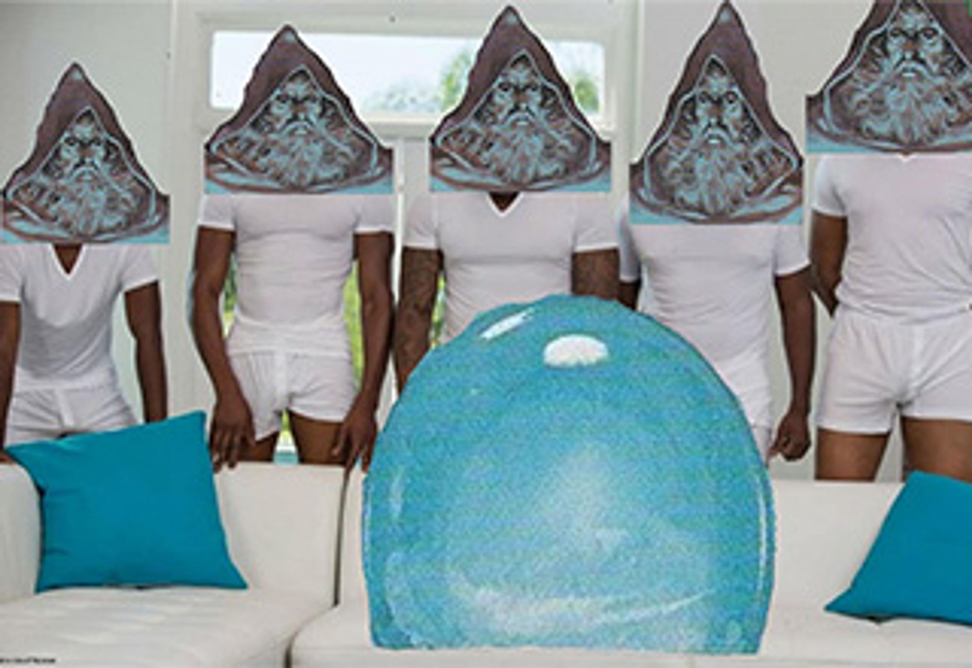 White couch with an orb sitting on it. 5 wizards standing behind it