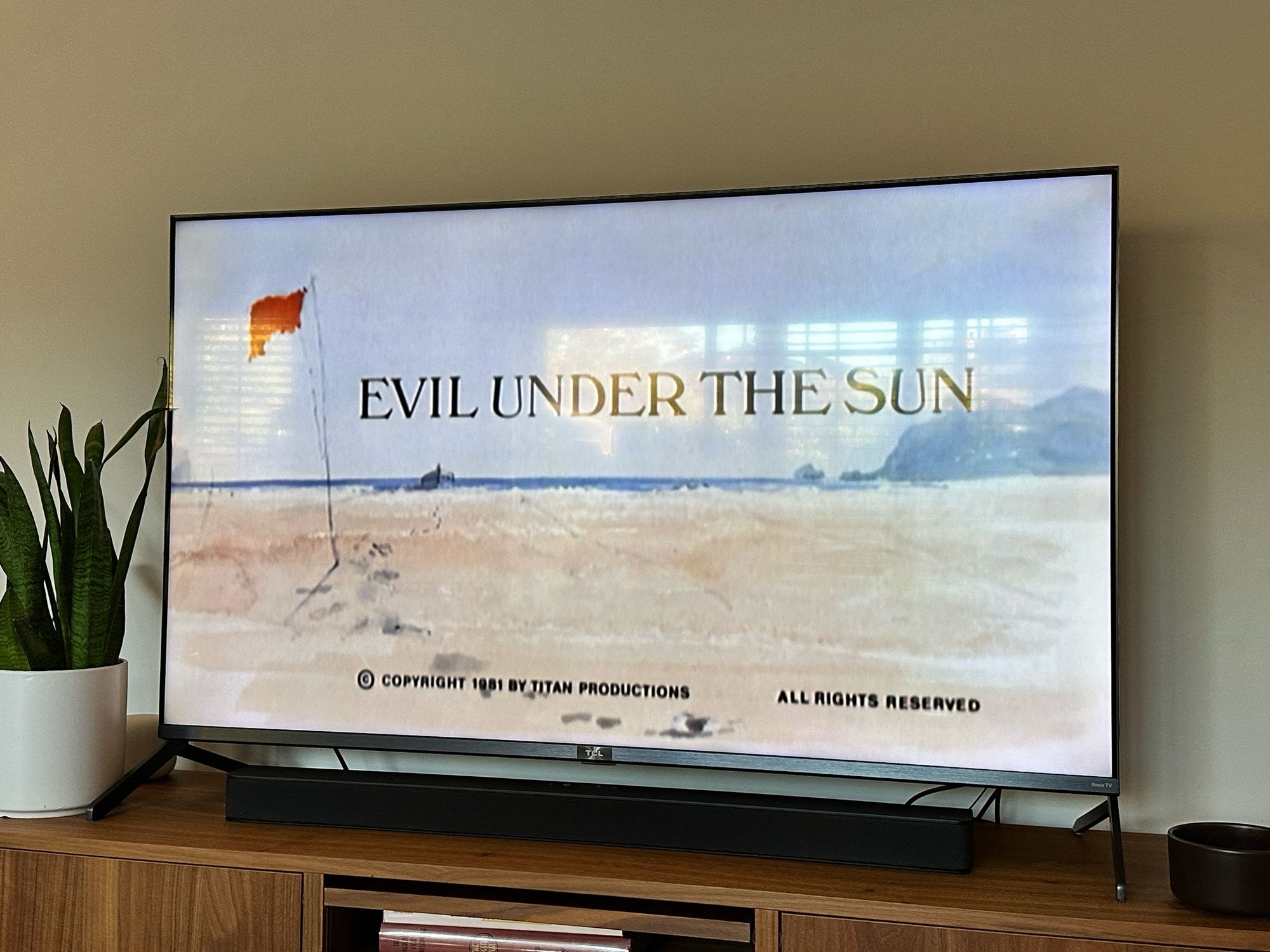 Screenshots of the title credits of EVIL UNDER THE SUN starring Dame Maggie Smith.