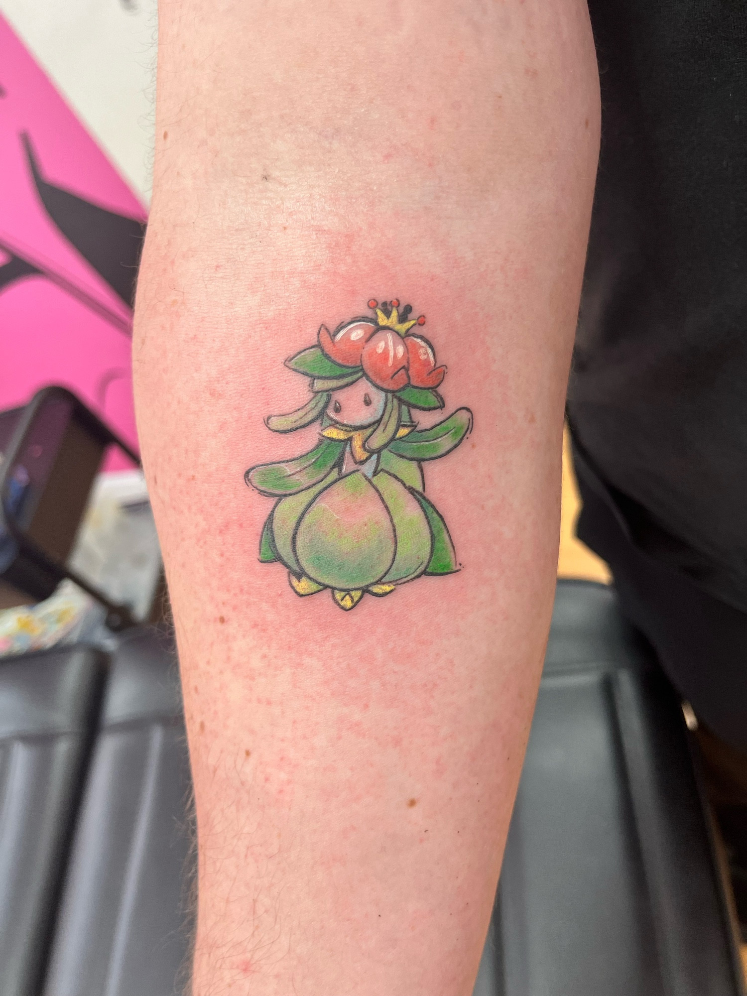 Colour tattoo of the Pokemon Lilligant on the forearm