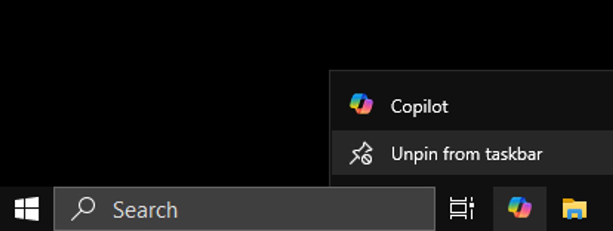 Closeup screenshot of Windows taskbar, with right-click menu of Copilot shortcut item open. Unpin from taskbar item is highlighted.