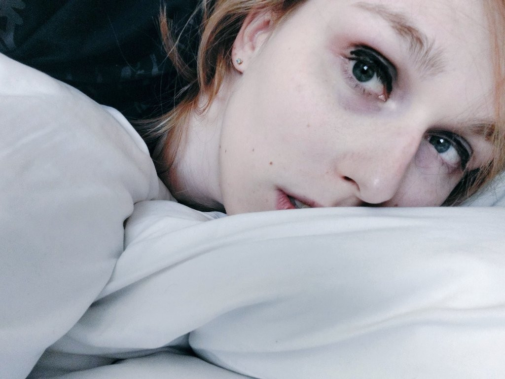 Blonde girl, white pillowcase, sleepy sleepy