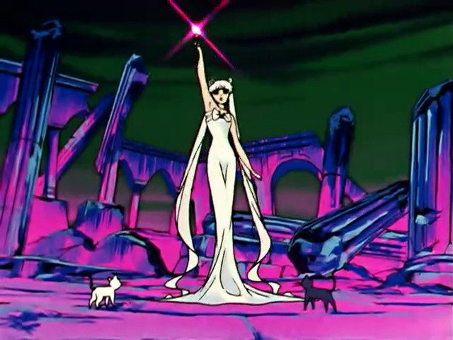 The Moon Princess holds aloft her moon staff with the silver crystal. The sky is deep green and black, while the ruins behind her are harsh pink and purple.